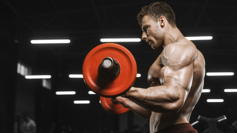 face red hair woman with big muscle arm lifting a heavy rock