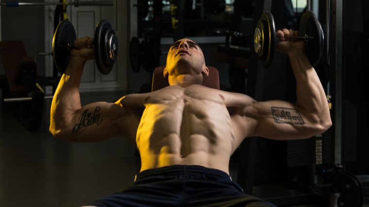 man doing incline dumbbell press 