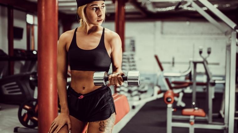 Woman lifting dumbbell