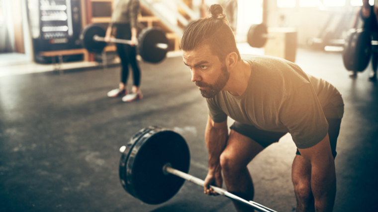 Man doing romanian deadlift 