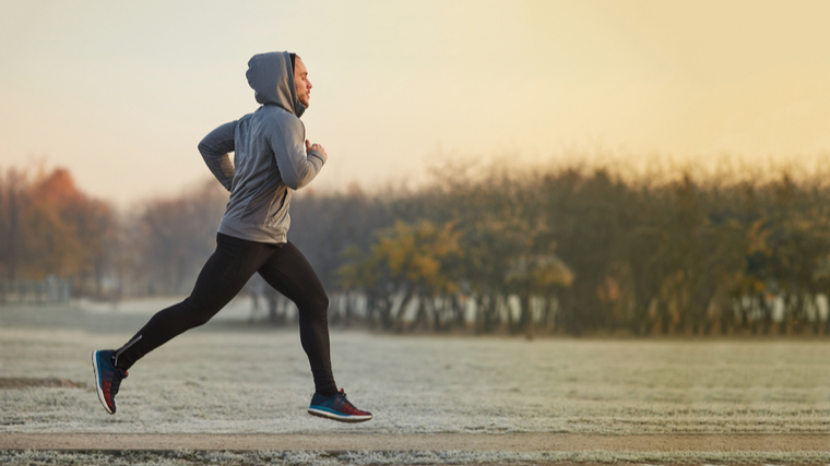 man jogging on winter morning