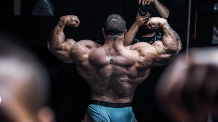 Bodybuilder Nick Walker flexing his back muscles