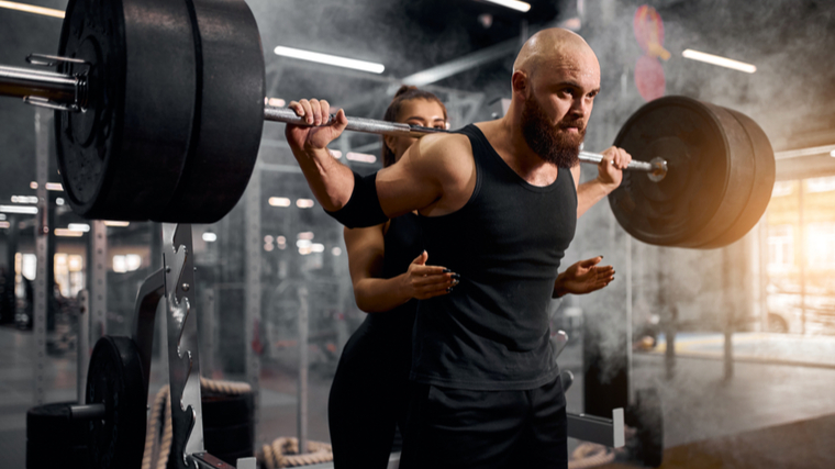 man setting up for squats 