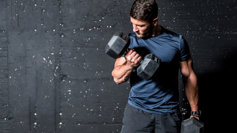 Man doing dumbbell curls 