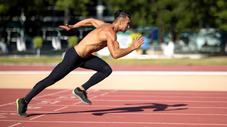 man sprinting on track 