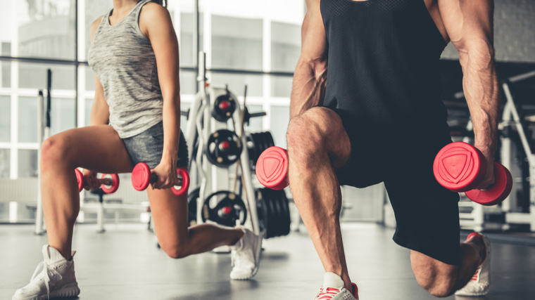 man and woman doing lunge 