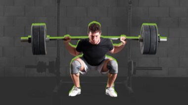 A person performs the 15 Best Barbell Exercises For Mass, Strength, and Power.