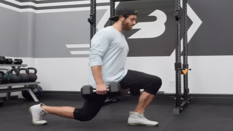 Jake Boly performs a lunge.