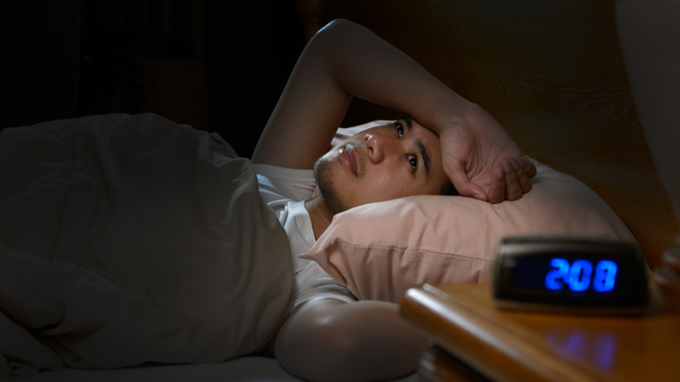 man suffering from insomnia