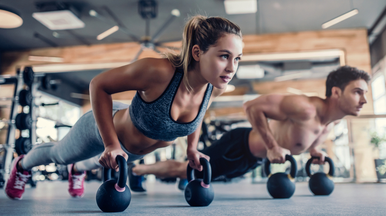 couple doing chest exercise