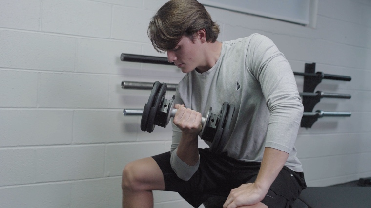 Jake Using The Select-A-Weights For Curls
