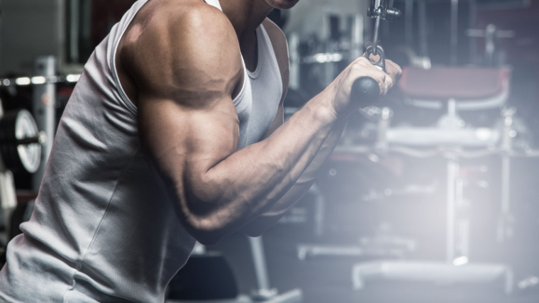 Man doing triceps pushdowns