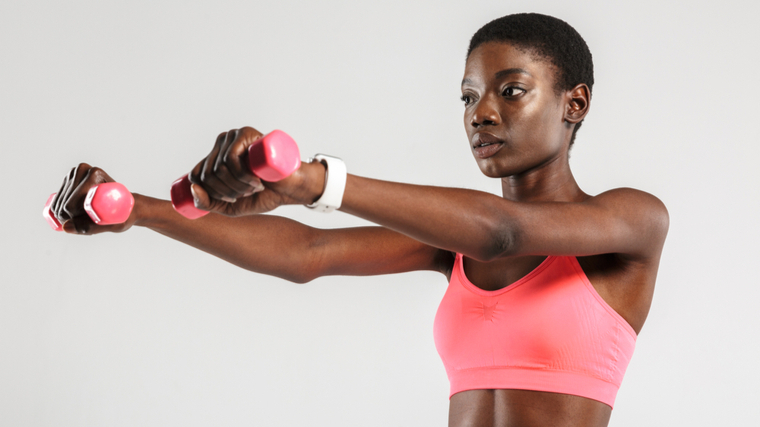 A person performs a dumbbell front raise.