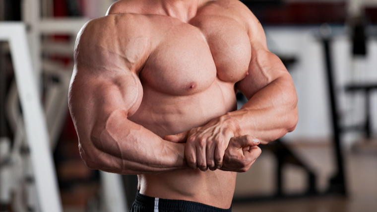 man hitting side chest pose 