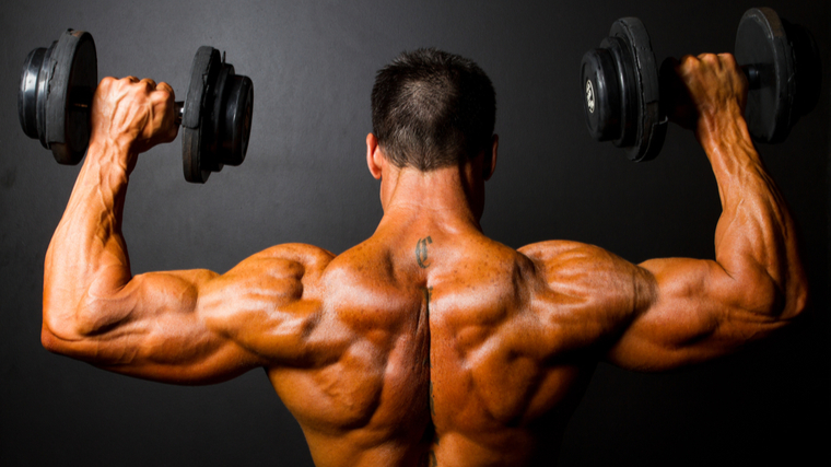 man doing shoulder press 