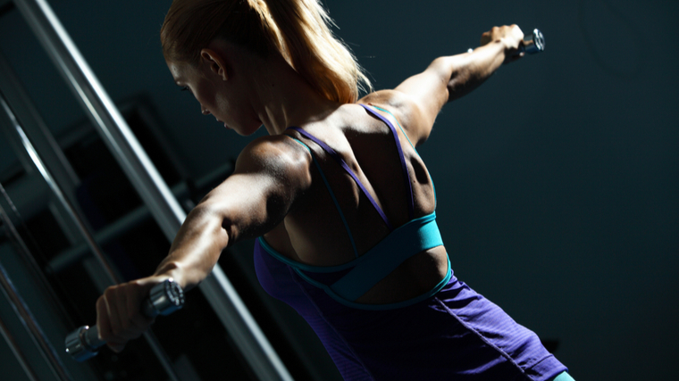 woman performing lateral raise 