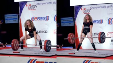 powerlifter Samantha Eugenie deadlifting 215-kilograms while wearing a black t-shirt and a black singlet on a lifting platform