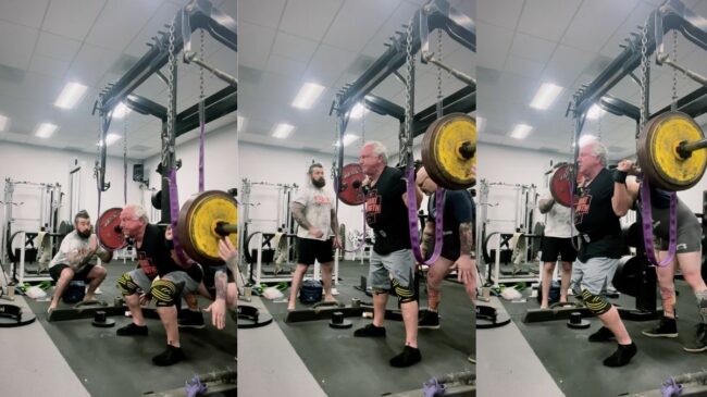 Powerlifter Rudy Kadlub squatting 206 kilograms wile wearing a black t-shirt, grey shorts, and yellow knee wraps
