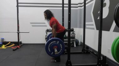 A person doing Rack Pulls For More Pulling Strength And A Bigger Back.