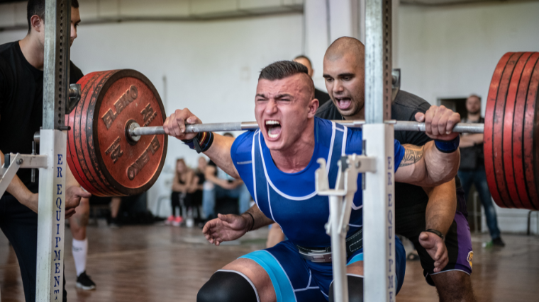 man attempting squat record