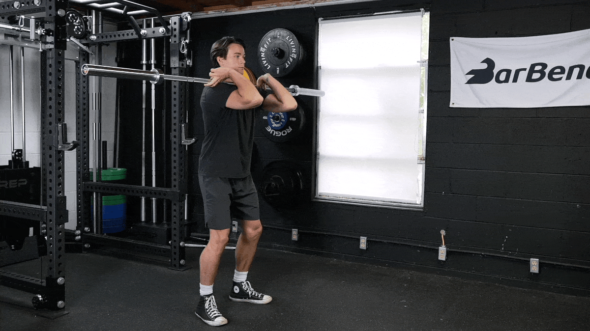 A person performing the front squat exercise.