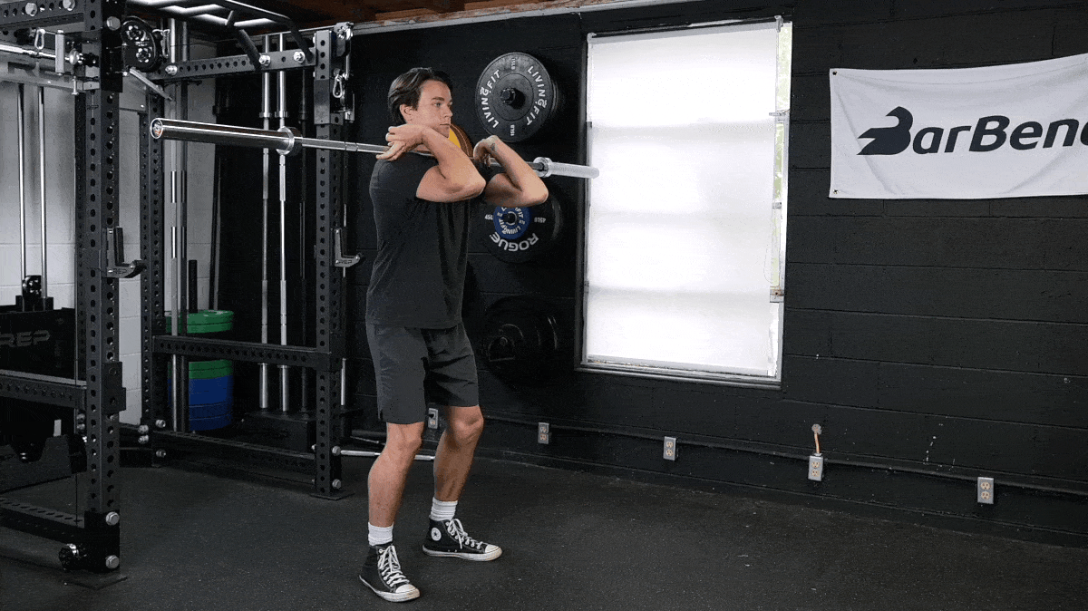 BarBend's Jake Herod performing the front squat exercise.