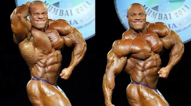 Bodybuilder Phil Heath performing a abs and thigh pose and side chest pose on stage/