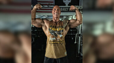 A photo of The Rock flexing for his Instagram.