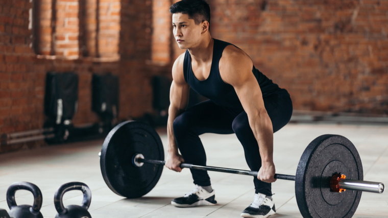 man sets up for deadlift