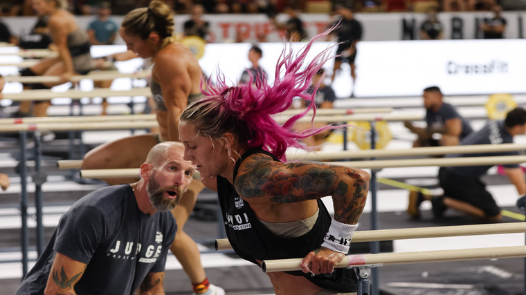 Danielle Brandon performs parallel bar dips at the 2022 CrossFit Games.