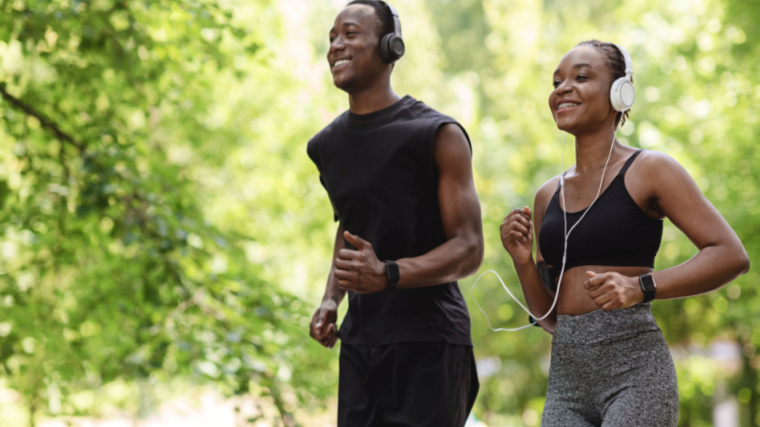 pair of athletes run outdoors