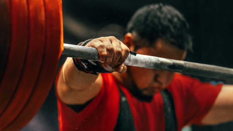 competitive powerlifter prepares to unrack squat attempt