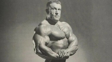 Bodybuilder Dorian Yates posing in a black-and-white photo.