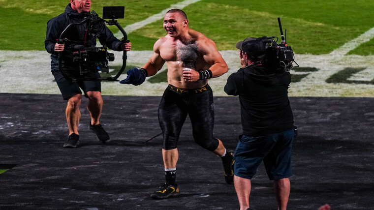 Roman Khrennikov smiles as he crosses the finish line during Event Four of the 2022 Rogue Invitational.