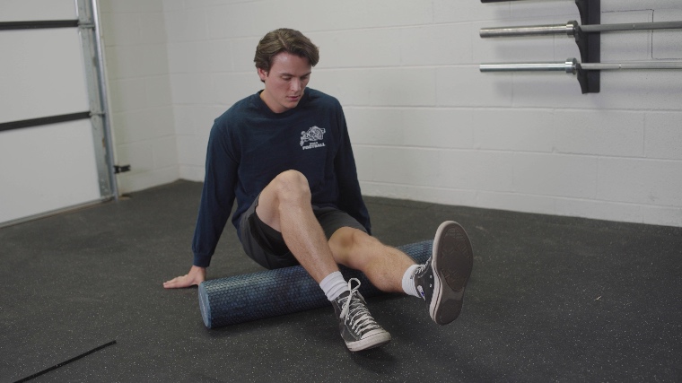 Jake Using the Living.Fit Foam Roller On His Legs