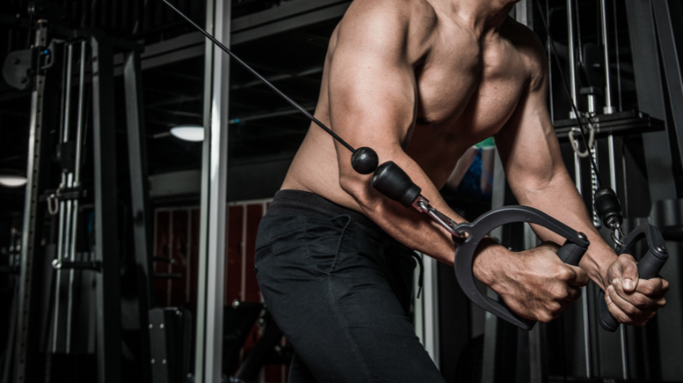 Man doing Standing cable crossover. cable flies exercise. Flat