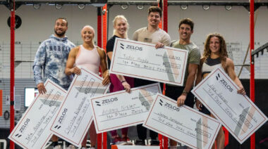 Athletes standing on podiums after the Zelos Games Invitational