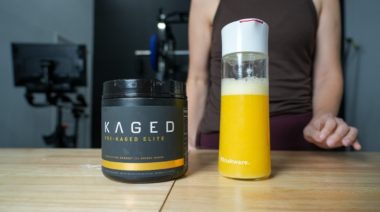 Our tester stands behind a Kaged Pre-Kaged Elite container and shake.