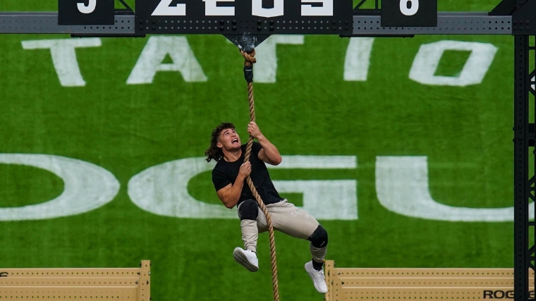 Justin Medeiros wins climbing a rope using just his upper body at the 2022 Rogue Invitational.