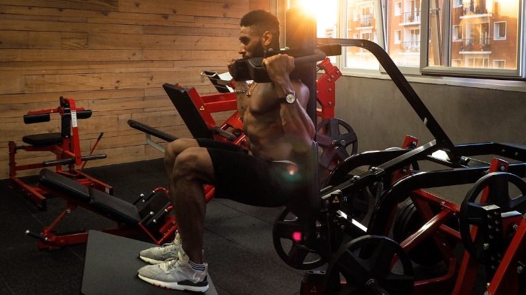 How to Use the Hack Squat Machine