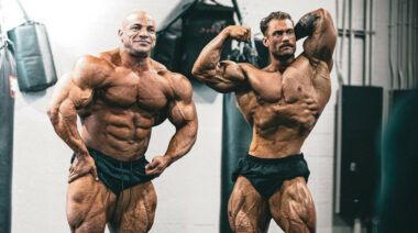 Big Ramy and Chris Bumstead posing.