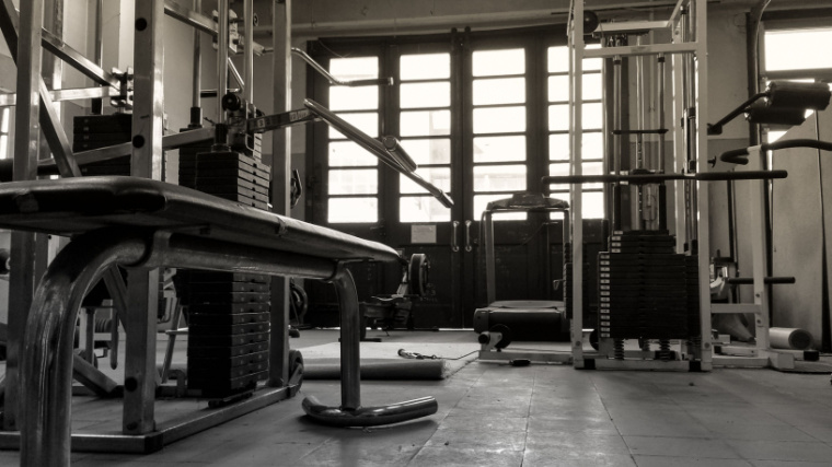 Various weight room equipment in garage