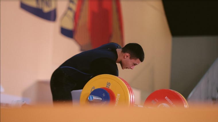 Italian weightlifter Sergio Massidda on the platform 