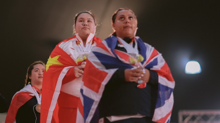 Li Wenwen on the podium at the 2022 World Weightlifting Championships