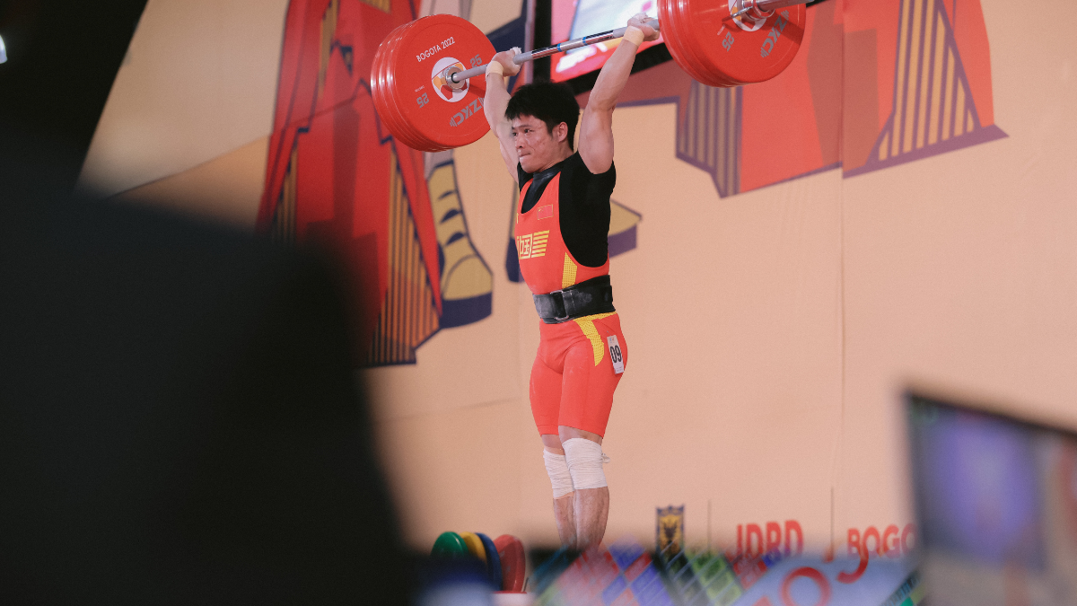 Weightlifter Li Fabin (61KG) Sets New World Record Clean and Jerk of 175KG at 2022 World Championships BarBend