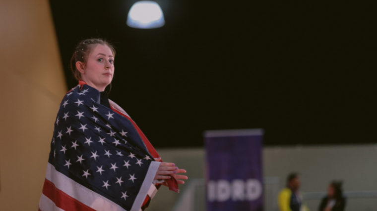 Olivia Reeves receiving clean & jerk medal