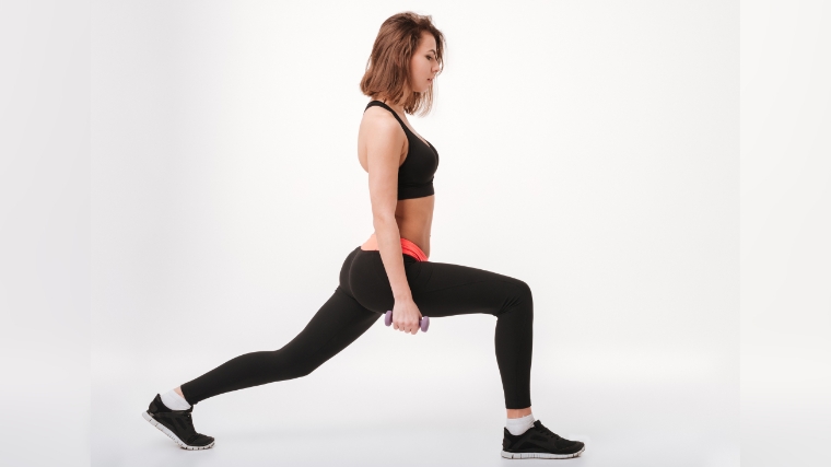 A person doing a split squat - Step 1, slide until front leg is bent at 90 degrees.