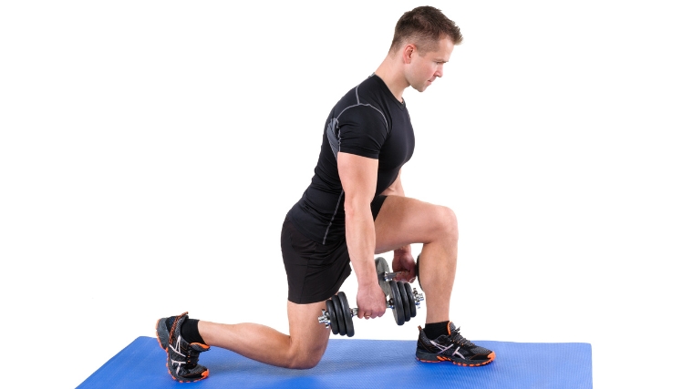 A person doing a split squat with weights.