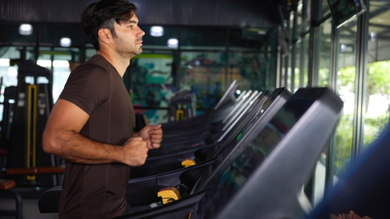 A person on a treadmill in the gym