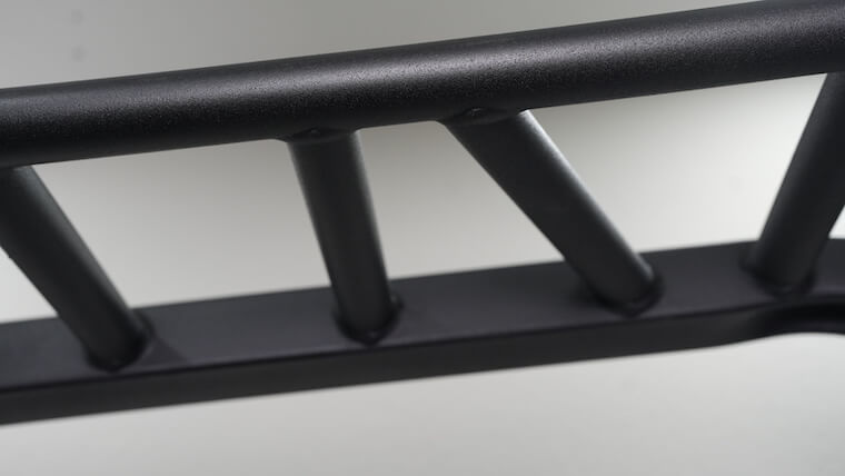 A close-up of the PRX Profile Pro Folding Squat Rack's pull-up bar.